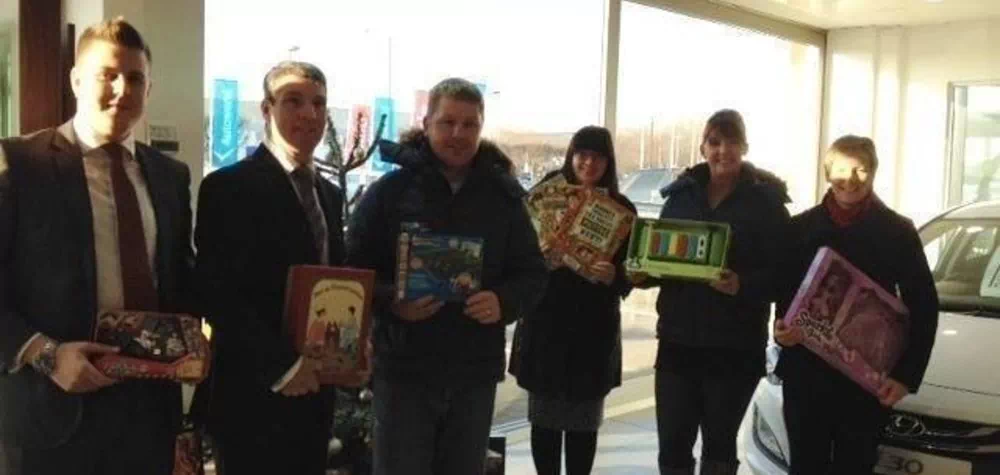 Banner Jones gives to the Toy Appeal